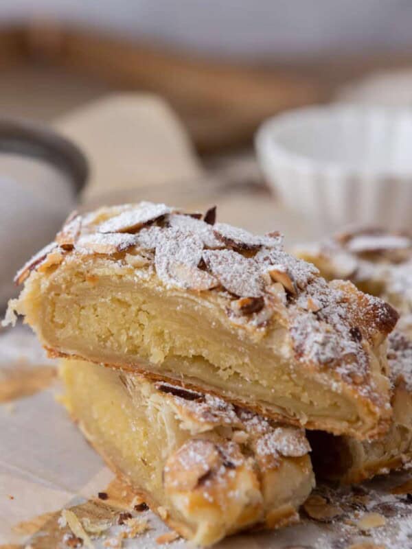 two pieces of the braided almond croissant danish recipe stacked on top of each other