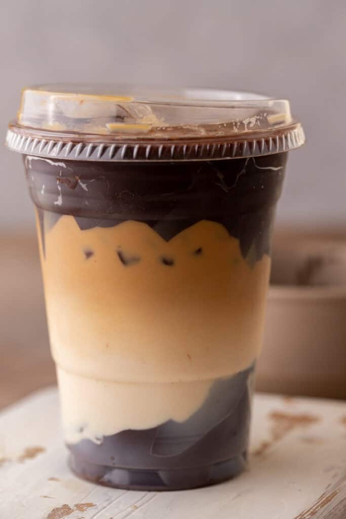 Close up of Tiktok Vital cracking latte