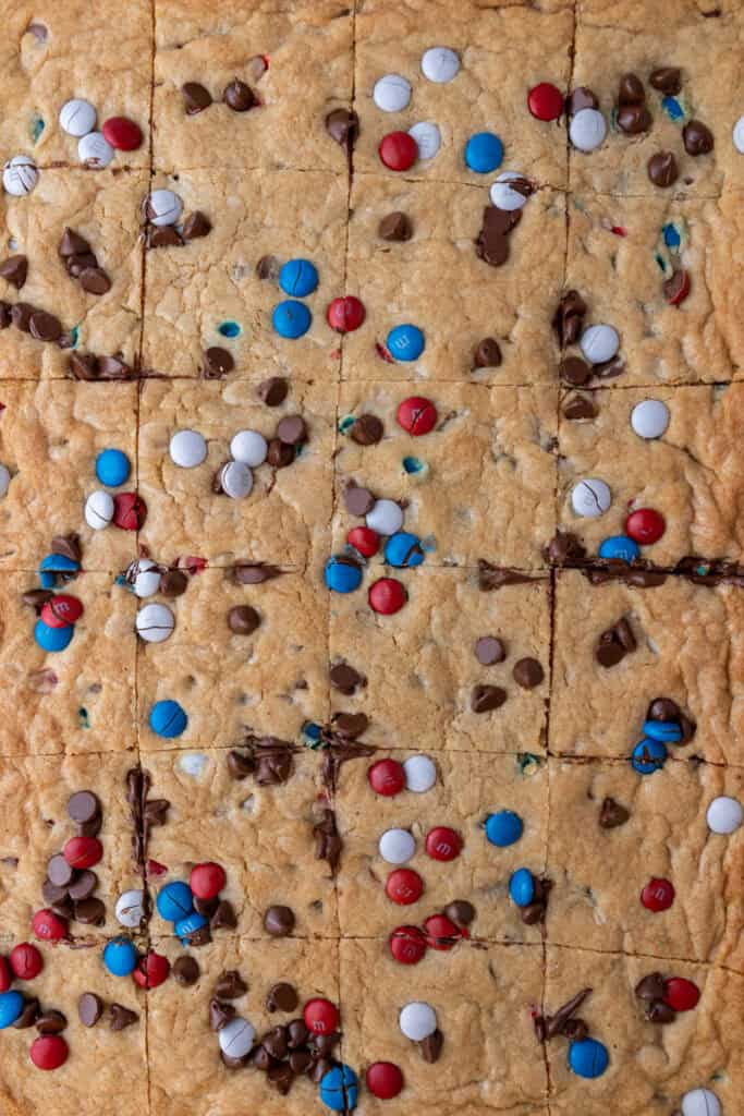 patriotic sheet pan red white and blue M&M's cookie bars sliced