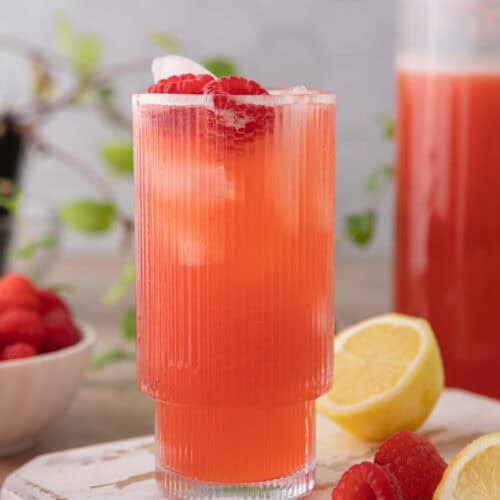 raspberry lemonade recipe in a glass with ice