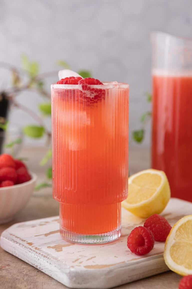 raspberry lemonade recipe in a glass with ice