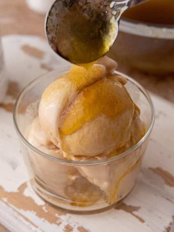 viral olive oil caramel recipe drizzled over ice cream