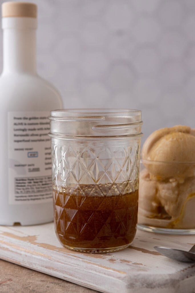 viral olive oil caramel recipe in a glass jar