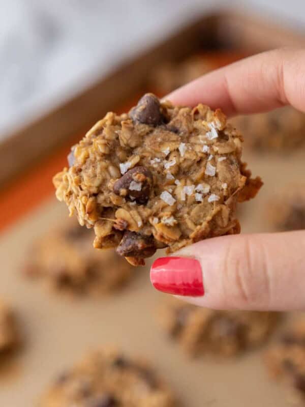 Healthy Oatmeal Banana Cookies being held up by a hand