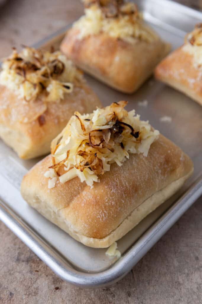 buns with cooked onions on top