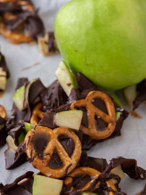 caramel apple bark recipe next to an apple