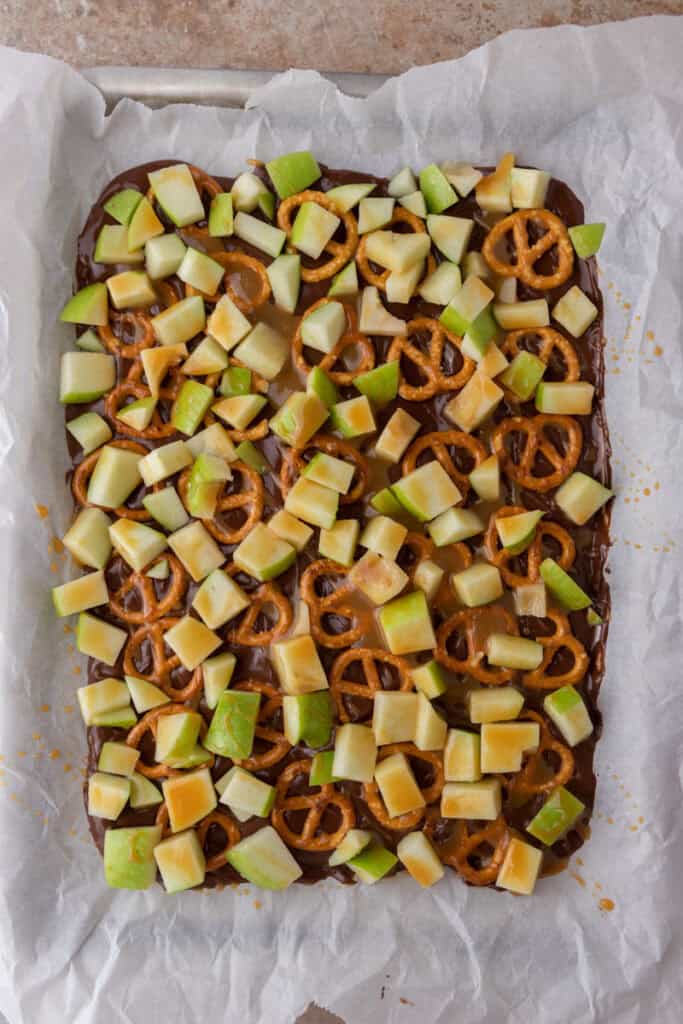 pretzels and other ingredients on top of the chocolate