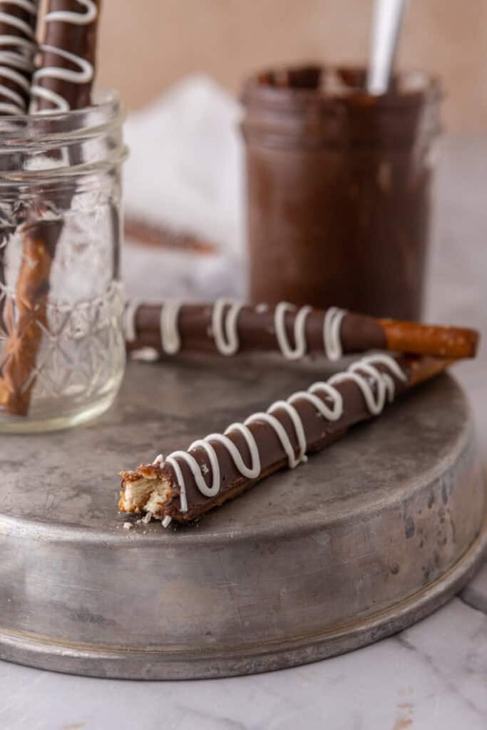 side shot of the caramel chocolate covered pretzel rods 