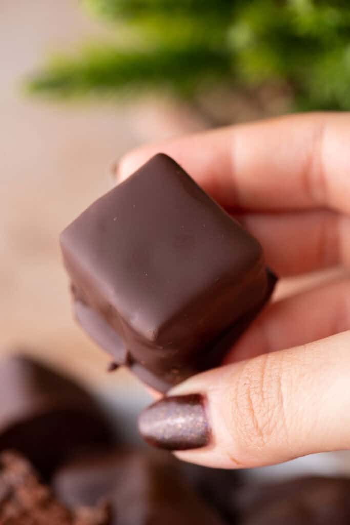 cool whip candy recipe being held up by a hand