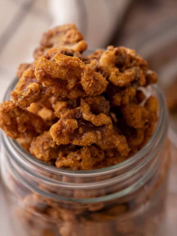 Holiday candied walnuts recipe in a mason jar