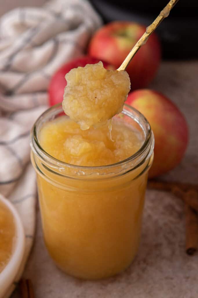 instant pot apple sauce in a spoon