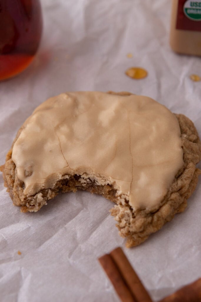 Maple Glazed Oatmeal Cookies stacked with a bite taken out