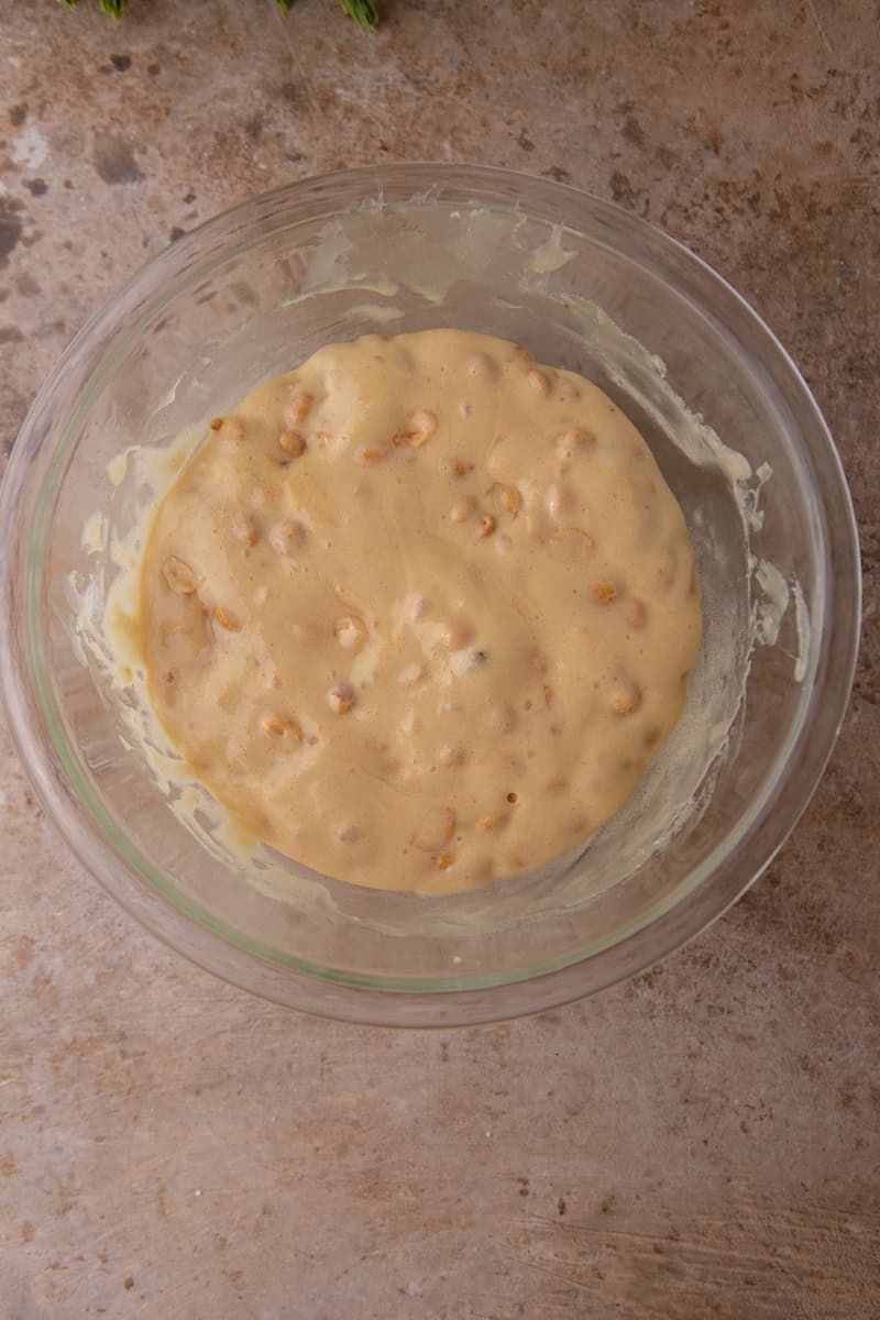 Pale, foamy brittle mixture right after stirring in the baking soda.