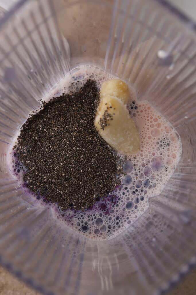 overhead shot of the smoothie ingredients in the blender