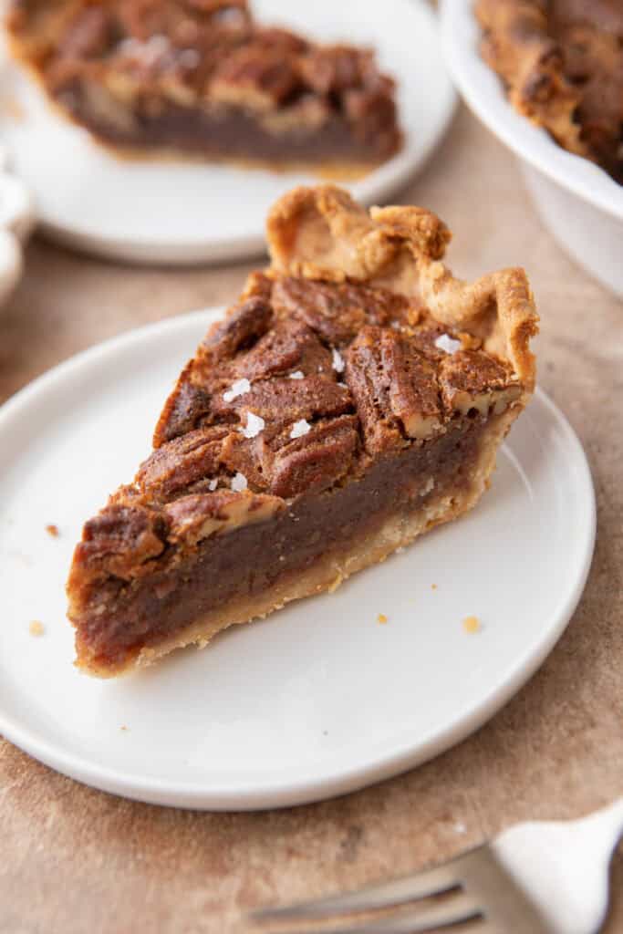 slice of the maple pecan pie on a plate