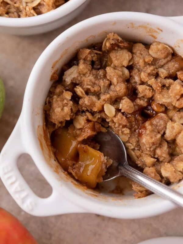 Microwave Apple Crisp for One recipe in a mug with a spoon