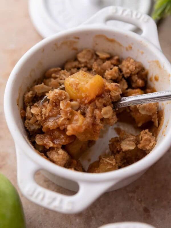 Microwave Apple Crisp for One recipe in a mug with a spoon