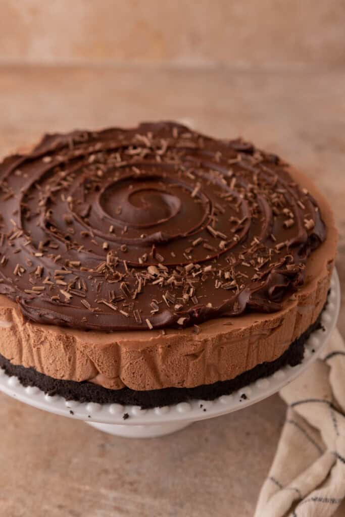 ganache being spread onto the filling