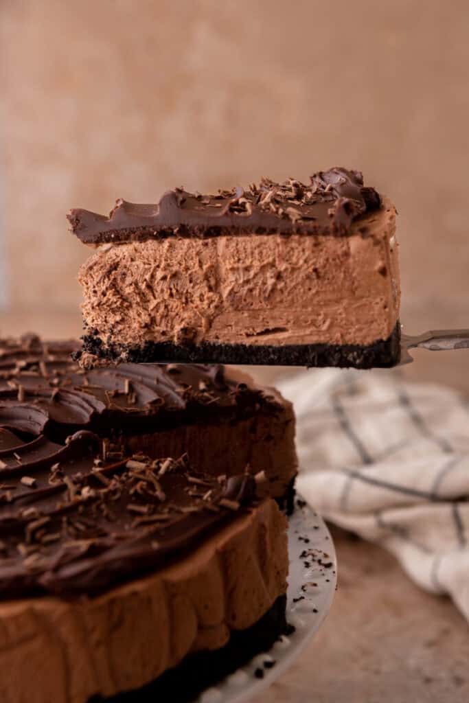 no bake chocolate cheesecake recipe with a slice taken out