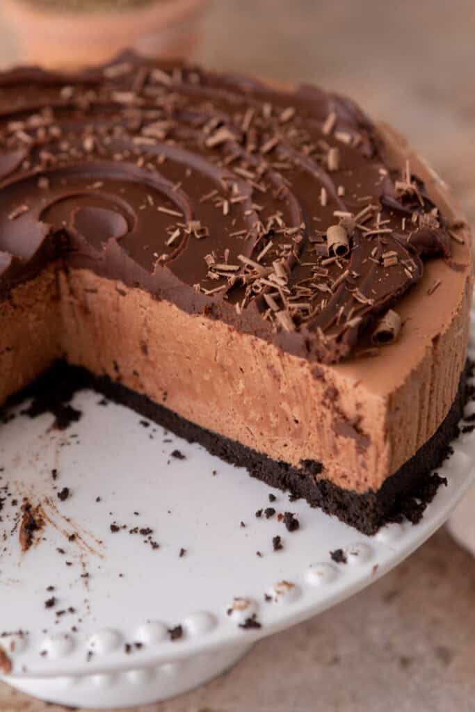 no bake chocolate cheesecake recipe with a slice taken out