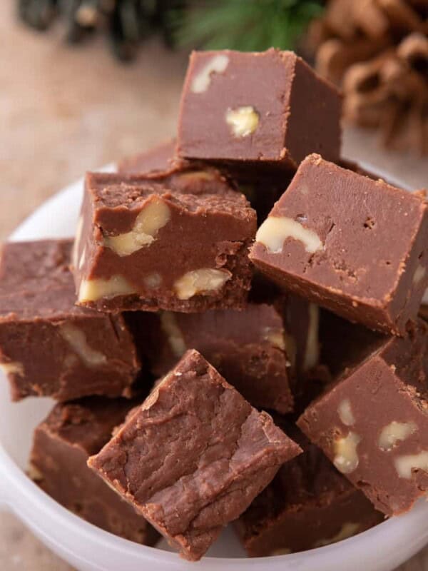 see's candy fudge recipe pieces stacked in a bowl