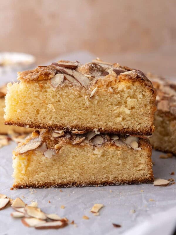 two slices of the almond cake recipe stacked on each other