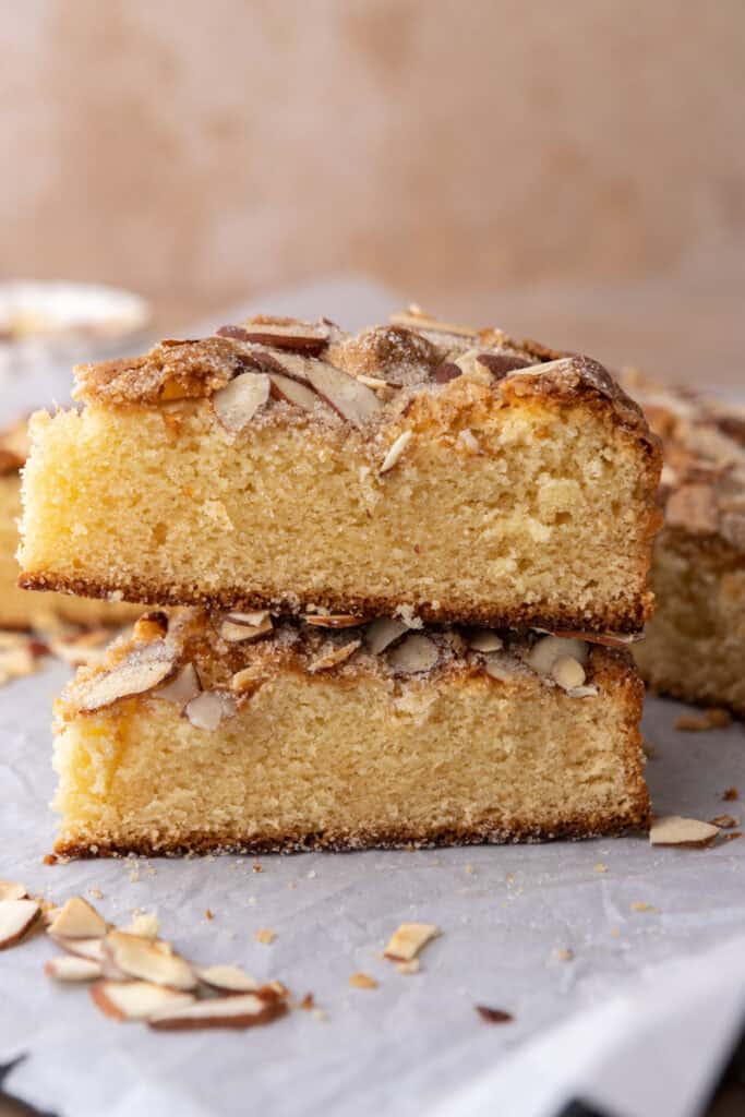 two slices of the almond cake recipe stacked on each other