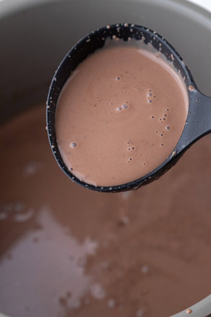 mixture being scooped by a ladle