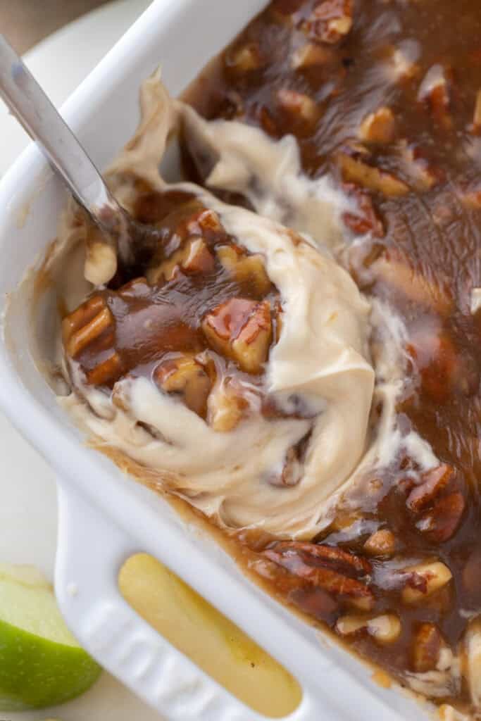 pecan pie dip recipe being scooped