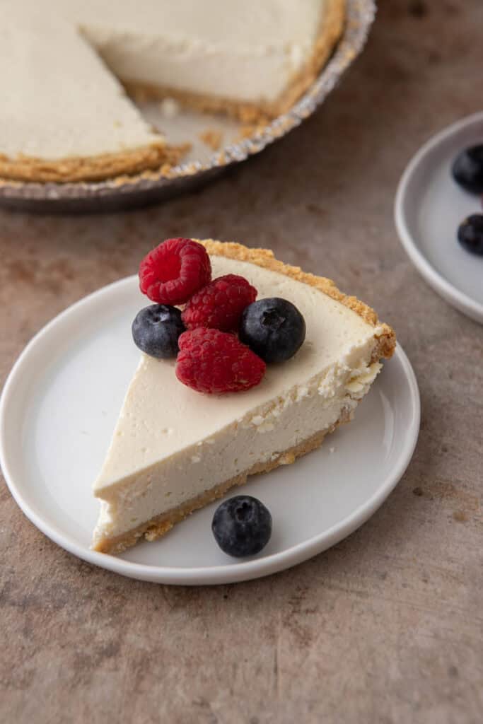 a High Protein Cottage Cheese Cheesecake slices on plate