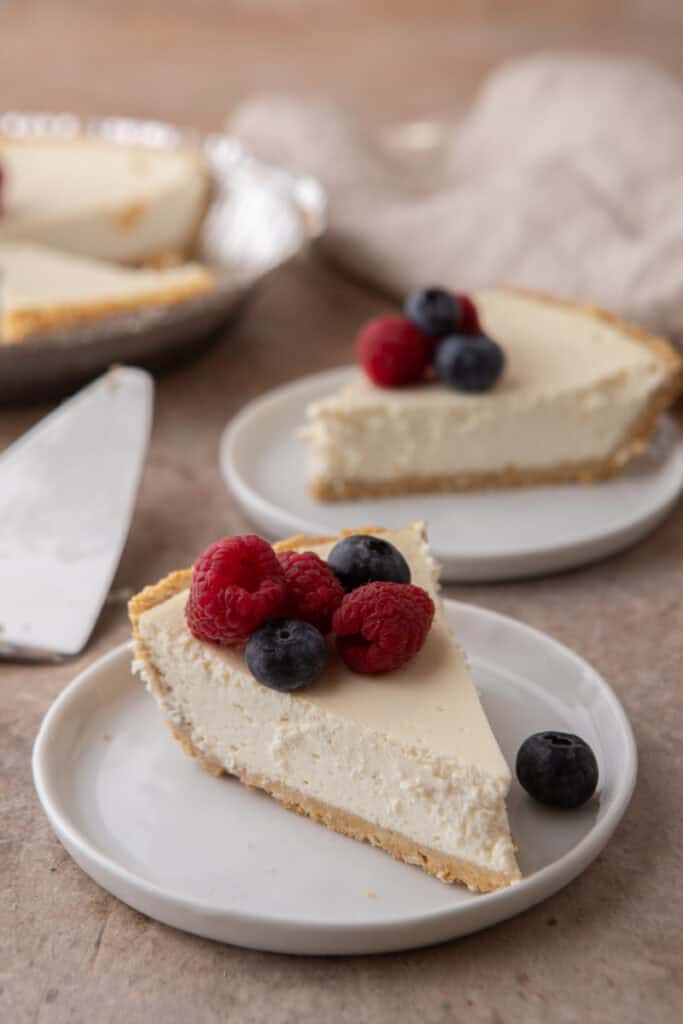 two High Protein Cottage Cheese Cheesecake slices on plates