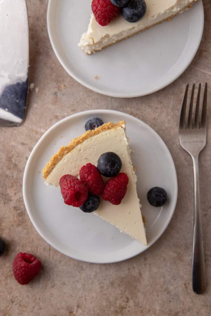 a High Protein Cottage Cheese Cheesecake slices on plate