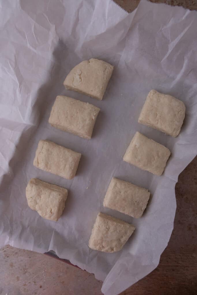 rolled out dough cut into individual pieces