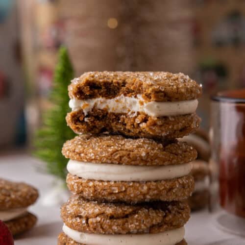 ginger molasses cookie sandwiches stacked on top of each other