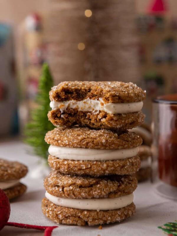 ginger molasses cookie sandwiches stacked on top of each other