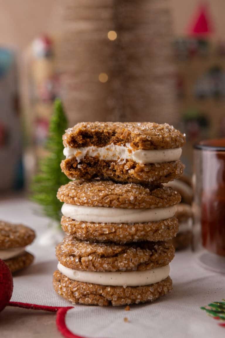 ginger molasses cookie sandwiches stacked on top of each other