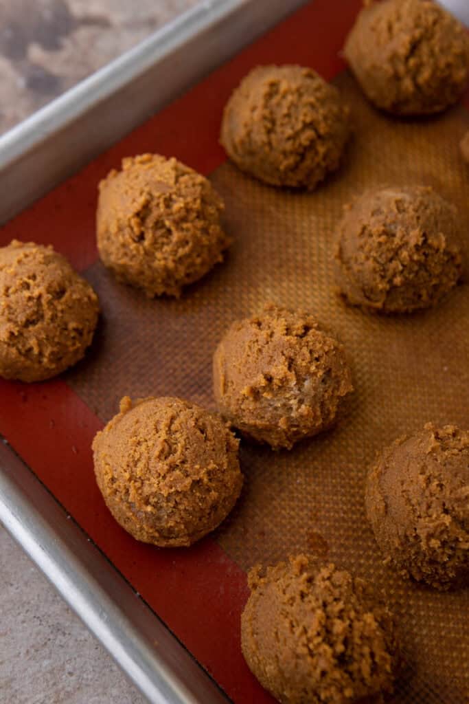 dough balls on a baking sheet