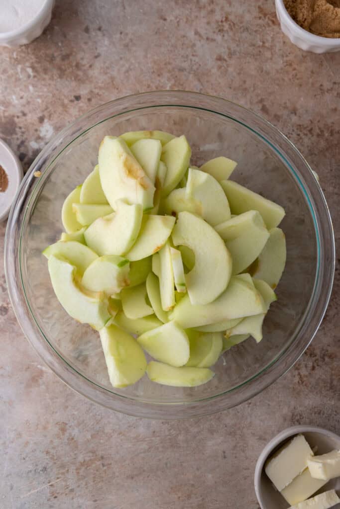 peeled and chopped fruit in a bowl