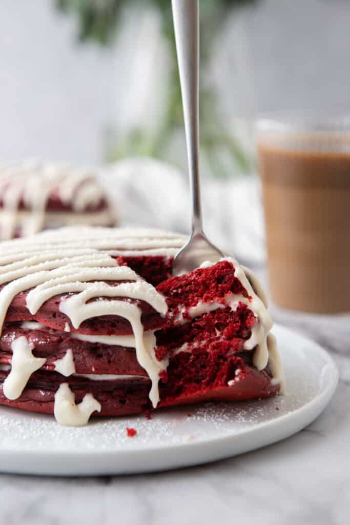 a stack of Red Velvet Pancakes Recipe on a plate