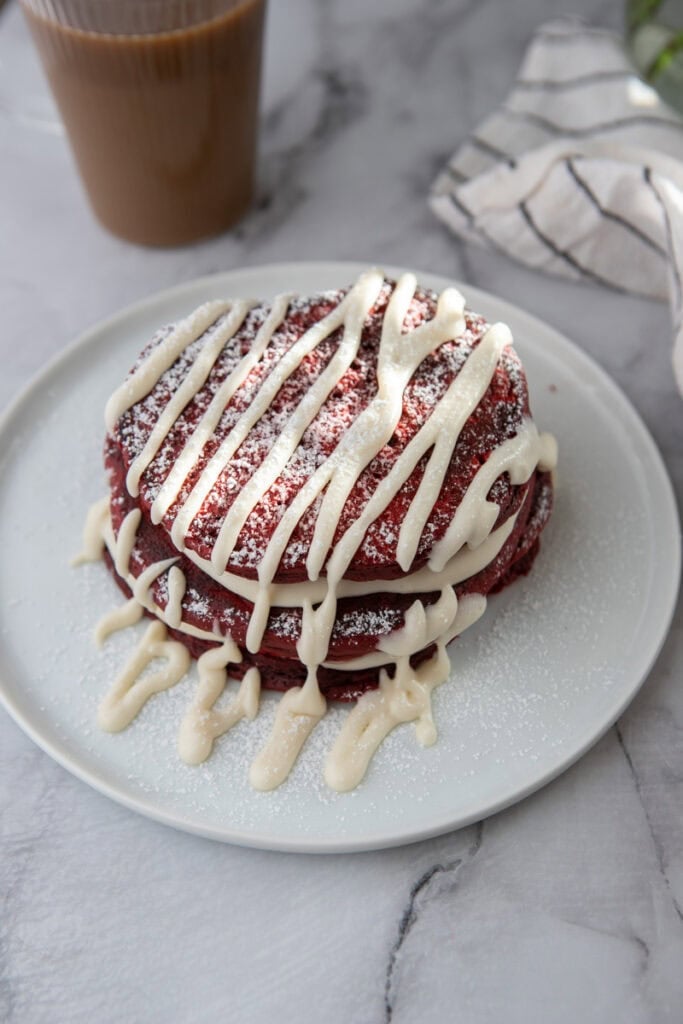 a stack of Red Velvet Pancakes Recipe on a plate