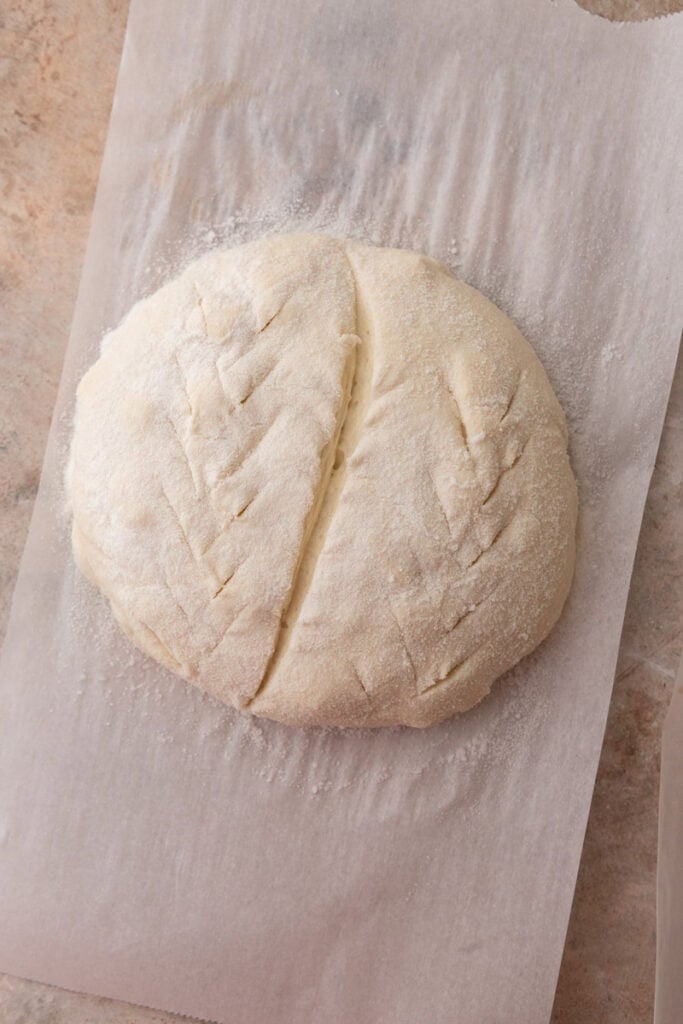 dough ball on parchment paper