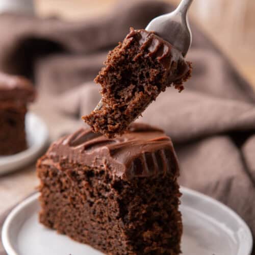 Sourdough Discard Chocolate Cake with a piece taken out with a fork