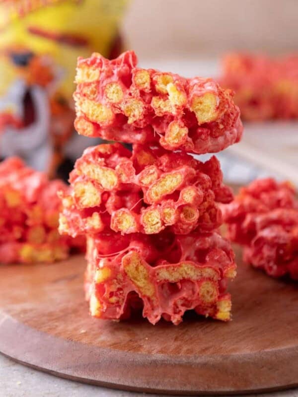 Hot Cheetos Marshmallow Crispy Treats recipe stacked on each other