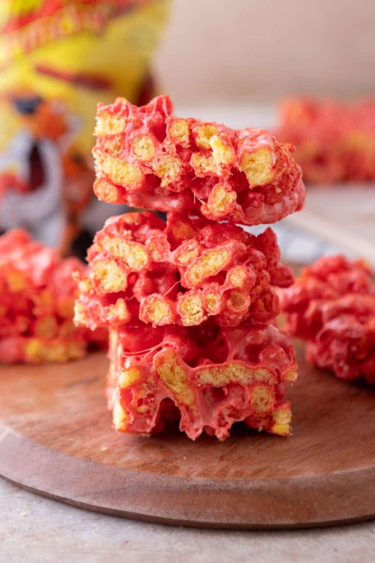 Hot Cheetos Marshmallow Crispy Treats recipe stacked on each other