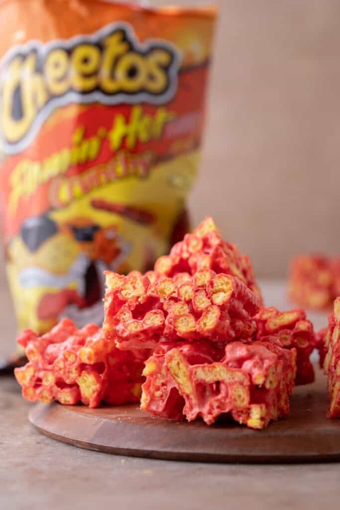 Hot Cheetos Marshmallow Crispy Treats recipe stacked on each other