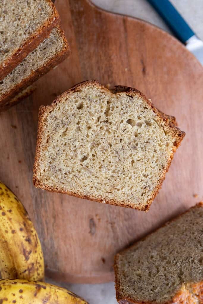 overhead shot of sourdough discard banana bread in slices