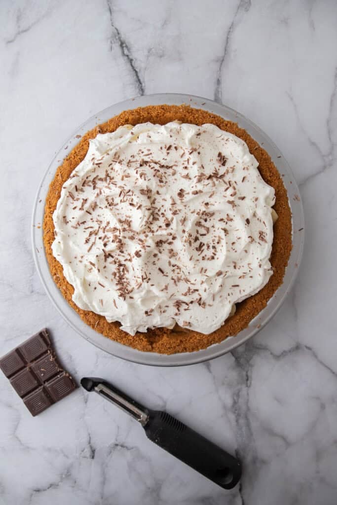 whipped cream and chocolate on top of other ingredients
