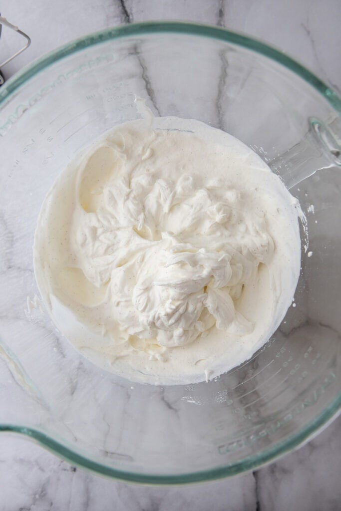 cream getting whipped in a bowl
