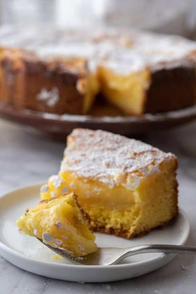 gooey butter lemon cake recipe slice on a plate