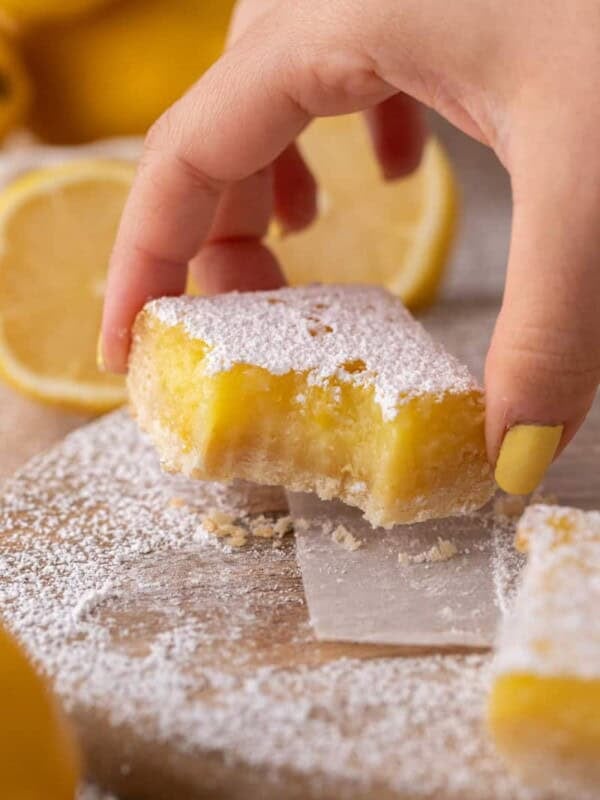 Hand Holding Small Batch Lemon Bars